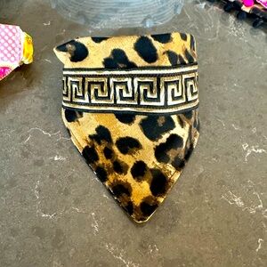 Handcrafted dog bandanna in Sm. Measures 13 to 15 inches around.
